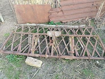 Kənd təsərrüfatı üçün çəkilə bilən dəmir mala (sürgü). -