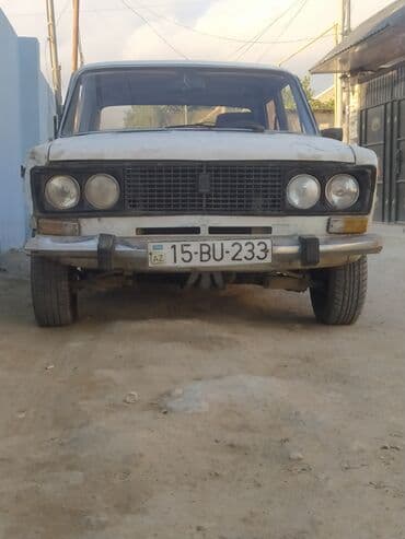 ваза стеклянная прозрачная высокая без узора: Avtomobil: VAZ 2106 (klassik “Jiquli” sedan) Rəng: ağ Kuzov: 4 qapılı — 1