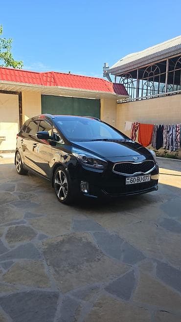 mini cps: Kia Carens (qara rəng), ili 2016, 7 yerlik rahat ailə miniveni — 1