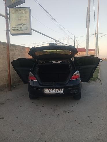kia forte diffuser: Opel Astra H – qara rəng, hetçbek kuzov Xüsusiyyətlər: - Kuzov: 5 — 2