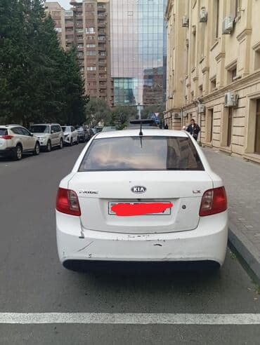 диски литые р14 на ниссан: Kia Rio: 1.5 l | 2010 il Sedan — 4