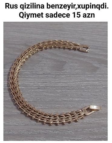 Zərgərlik aksesuarları seçimi - Xupinq qolbaq: Rus qızılına bənzəyən