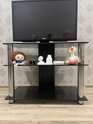 televizor stend: - Məhsul: Şüşə TV stendi - Brend/Model: (stend) – 3 səviyyəli, qara — 1