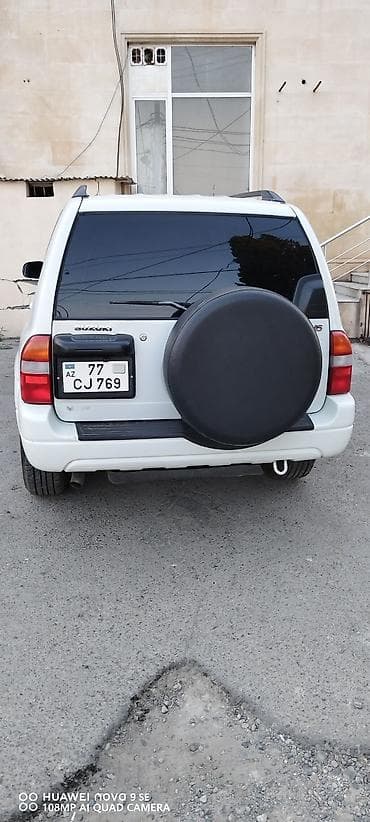 suzuki burgman: Suzuki Grand Vitara XL-7, ağ rəng, 7 yerlik tam ölçülü SUV. Texniki — 6