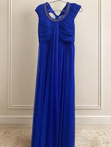 Zümrüd mavisi rəngdə uzun ziyafət/libas. Yebidir S razmer yəni 36