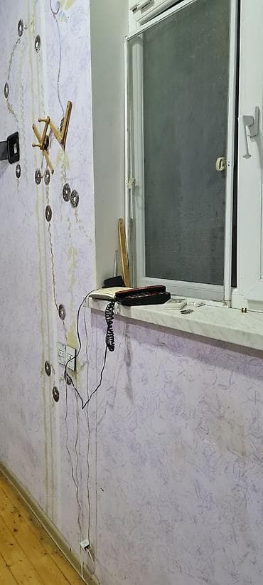 yevlax ev: Bakı Tikiş Evinin (keçmiş Volodarski fabriki) arxasındakı məhəllədə — 2