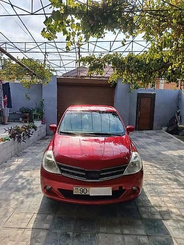 a6 audi: Nissan Tiida: 1.6 l | 2008 il Sedan — 6