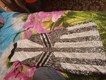 Parlaq payetli qadın paltarı - Model: Ətəyə doğru bir qədər