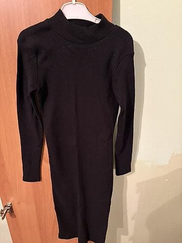 Qara trikotaj don - Model: sadə, bədənə oturan siluet - Uzunluq: midi