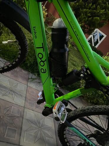 1 yaşdan yuxarı uşaqlar üçün velosipedlər: İşlənmiş Dağ velosipedi Toba, 26", sürətlərin sayı: 10, Ünvandan götürmə — 7