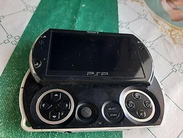 memo cx: Sony PSP Go (PSP-N100x) əl konsolu - Sürüşdürülən dizayn: ekran — 7