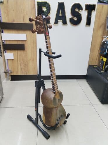 tar qabı: Tar aləti Rast musiqi alətləri mağazalar şəbəkəsi 3 ünvanda yerləşir; — 1
