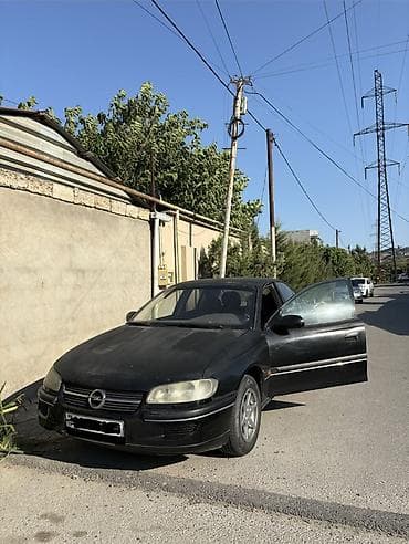 vaz 2107 abilsofka: Opel Omega B, sedan, qara rəng. Texniki və funksional xüsusiyyətlər — 1