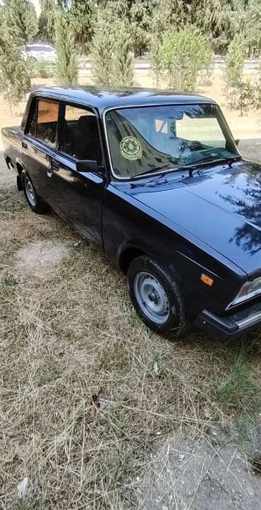 dörd göz maşın: Model: Lada (VAZ) 2107 Kuzov: sedan, tünd mavi rəng Dövlət nömrə — 6