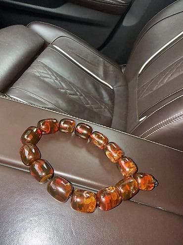 Zərgərlik əşyaları: Qəhvəyi-kəhrəba rəng çalarlarında böyük formalı muncuqlardan ibarət — 2