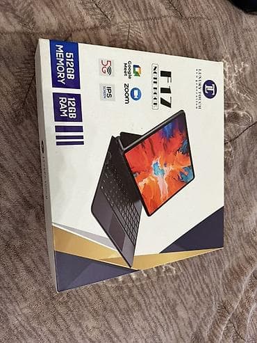 Samsung: Planşet boz rəngli qabığı ilə təqdim olunur, bu da ona zərif görünüş — 5