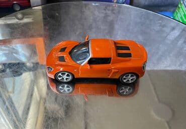 metbex tavan modelleri: Коллекционная модель Opel Speedster orange 2000 DeAgostini Art  — 9