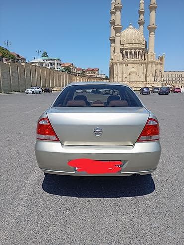 Nissan Sunny: 1.6 l | 2008 il Sedan — 2