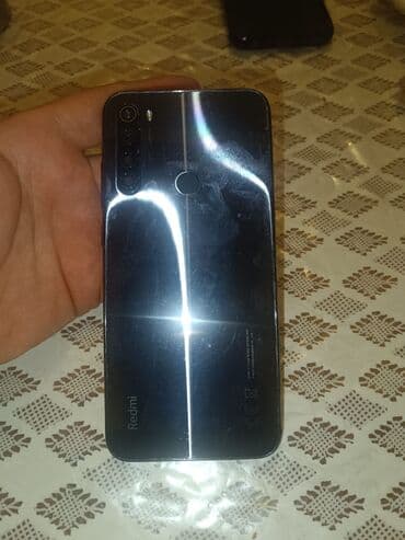 redmi note 9 ucuz: Xiaomi Redmi smartfon - Model: Redmi (arxa tərəfdə “Redmi” logo — 2