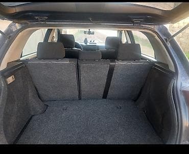 vito disk: Toyota Corolla hatchback (E12), tünd mavi rəng. - Kuzov: 5 qapılı — 9