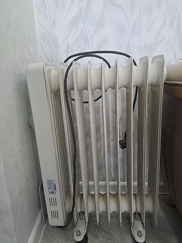 seksiyalı radiator: Yağlı radiator tipli elektrikli isidici - 7 bölməli yağ radiatoru; — 1
