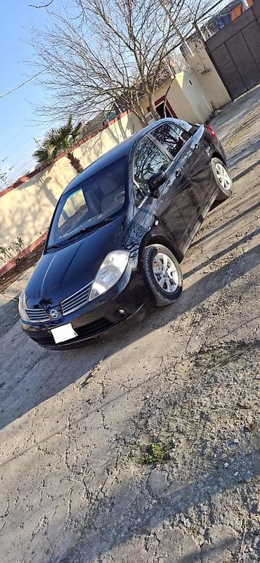 avto 312: Nissan Tiida: 1.6 л | 2006 г. Седан — 8