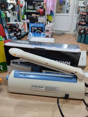 paketləmə: Salafan yapişdiran paketləmə aparati salafan ağzı yapışdıran salafan — 2