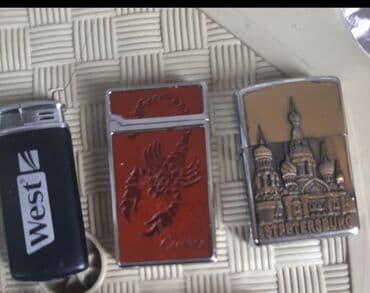 nol yedi sekileri: Qazlı alışqanlar dəsti - 3 ədəd müxtəlif dizaynlı alışqan: - “West” — 1