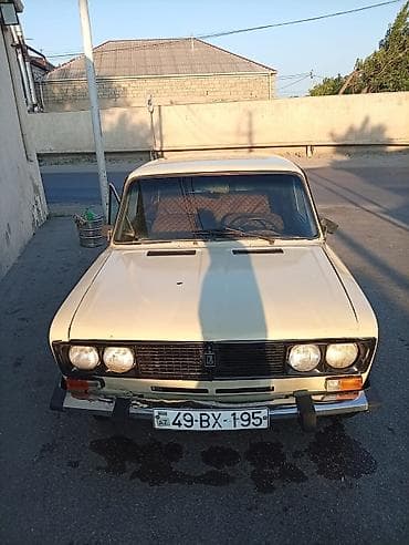Nəqliyyat: VAZ 2106 sedan - Korpus: 4 qapılı, bej/ağ rəng, xrom bamperlər — 3