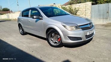 daewoo gentra necə maşındır: Opel Astra H – 5 qapılı hetçbek, gümüşü rəng. - Nömrə: 99 VU 521 - — 7