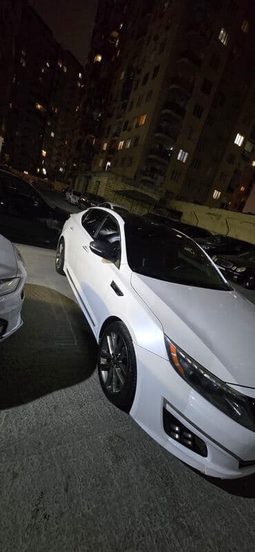 fiat doblo ölüxana: Kia Optima – ağ rəngli sedan Xarici: - Ağ kuzov, qara panoramik dam - — 7