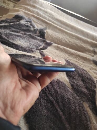 komputer korpusu: Samsung A10e, rəng - Mavi, Barmaq izi — 7