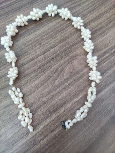 tək qaş: Boyunbağı — 2