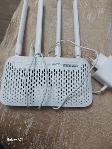 ucuz modem: Xiaomi Mi Router 4A modeli dörd xarici antenası sayəsində yüksək — 1