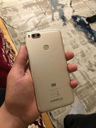 oppo find x6 pro: Xiaomi Mi A1, 64 GB, rəng - Qara, 
 Sensor, Barmaq izi, İki sim kartlı — 10