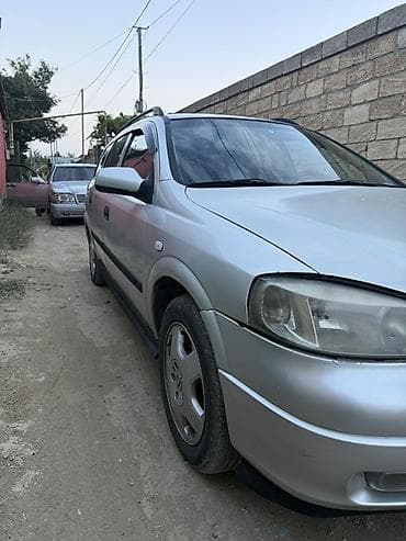 forut satsi: Opel Astra G (universał) – gümüşü rəng Texniki və komplektasiya: - — 3