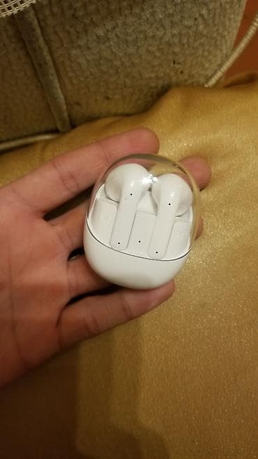 Simsiz stereo qulaqlıqlar – ağ rəngdə, şəffaf qapaqlı kompakt şarj lalafo.az -da Simsiz stereo qulaqlıqlar – ağ rəngdə, şəffaf qapaqlı kompakt şarj