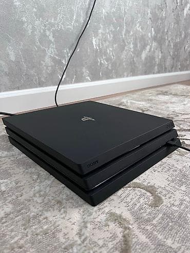 ps4 silm: Sony PlayStation 4 Pro oyun konsolu Xüsusiyyətlər: - Model: PS4 Pro — 1