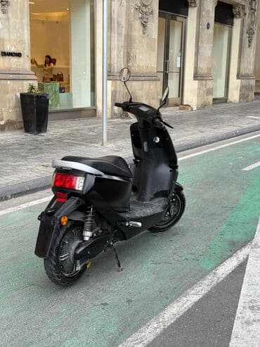 электро мотоцикл: Elektrik skuter – şəhər içi sürüş üçün ideal, kompakt və səssiz. 2000w — 5