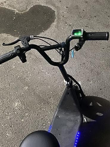 Oturacaqlı elektrik skuter -saatda 20 km surerle hereket edir — 5