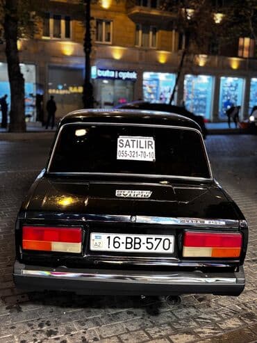teker yazilari: Model: Lada 2107 Kuzov: sedan, qara rəng Dövlət nömrə nişanı — 1