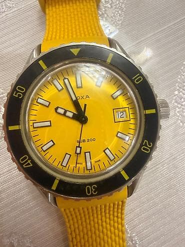 Doxa saat. Dubaydan alınıb. 5500aed. Pasportu ve qutusu yoxdur. Unisex