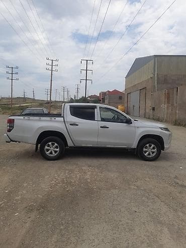 Mitsubishi L200: 2.4 л | 2019 г. 154800 км Пикап — 4
