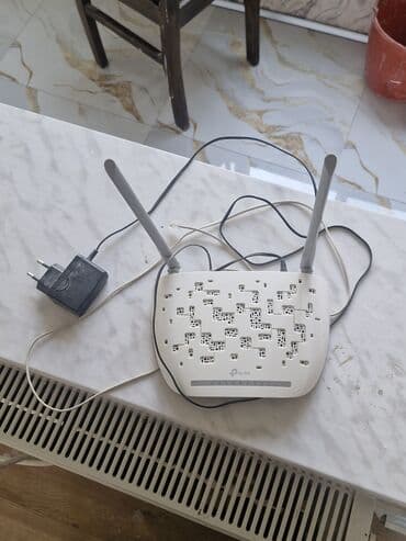 modem outdoor: TP-Link istehsalı olan bu simsiz router, yüksək sürətli internet — 3