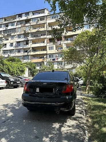 diskilər: Kia Rio: 1.4 l | 2008 il Sedan — 5
