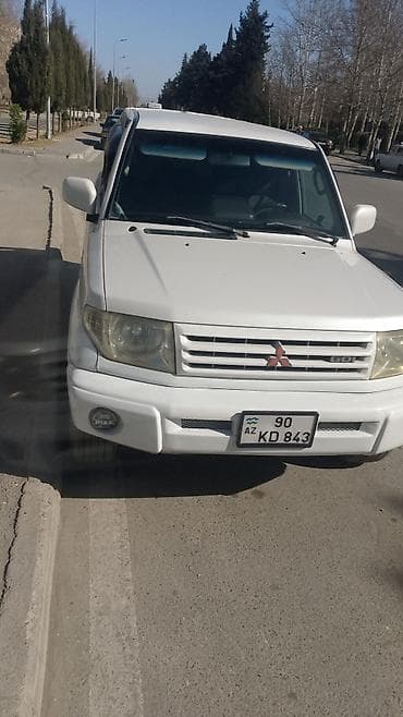 daewoo lanos nece masindir: Mitsubishi Pajero iO (GDI) – ağ rəngli, 5 qapılı kompakt SUV. İlkin — 4