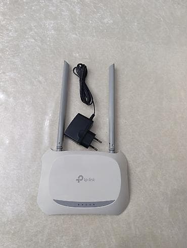 ev modemi: TP-Link simsiz Wi‑Fi router - Brend/model: TP-Link (şəkildəki seriya — 1