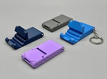 Mobil telefon və aksesuarlar: 📱🔑 Kompakt Telefon Tutacağı + Açarliq Kiçik ölçü, böyük rahatlıq! Bu — 9