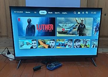 TAUBE smart televizor - Ekran: təxminən 32–40 düym diaqonal, nazik