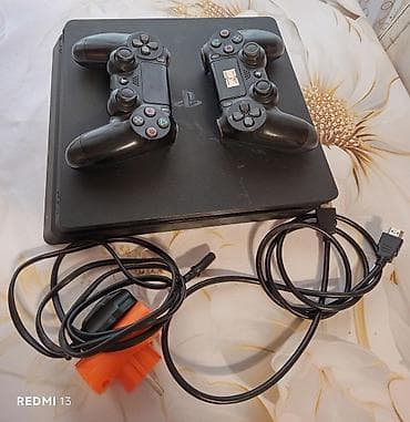 notebook hdd 1tb: PlayStation 4 Slim oyun konsolu paketi - Model: PS4 Slim (Sony — 1